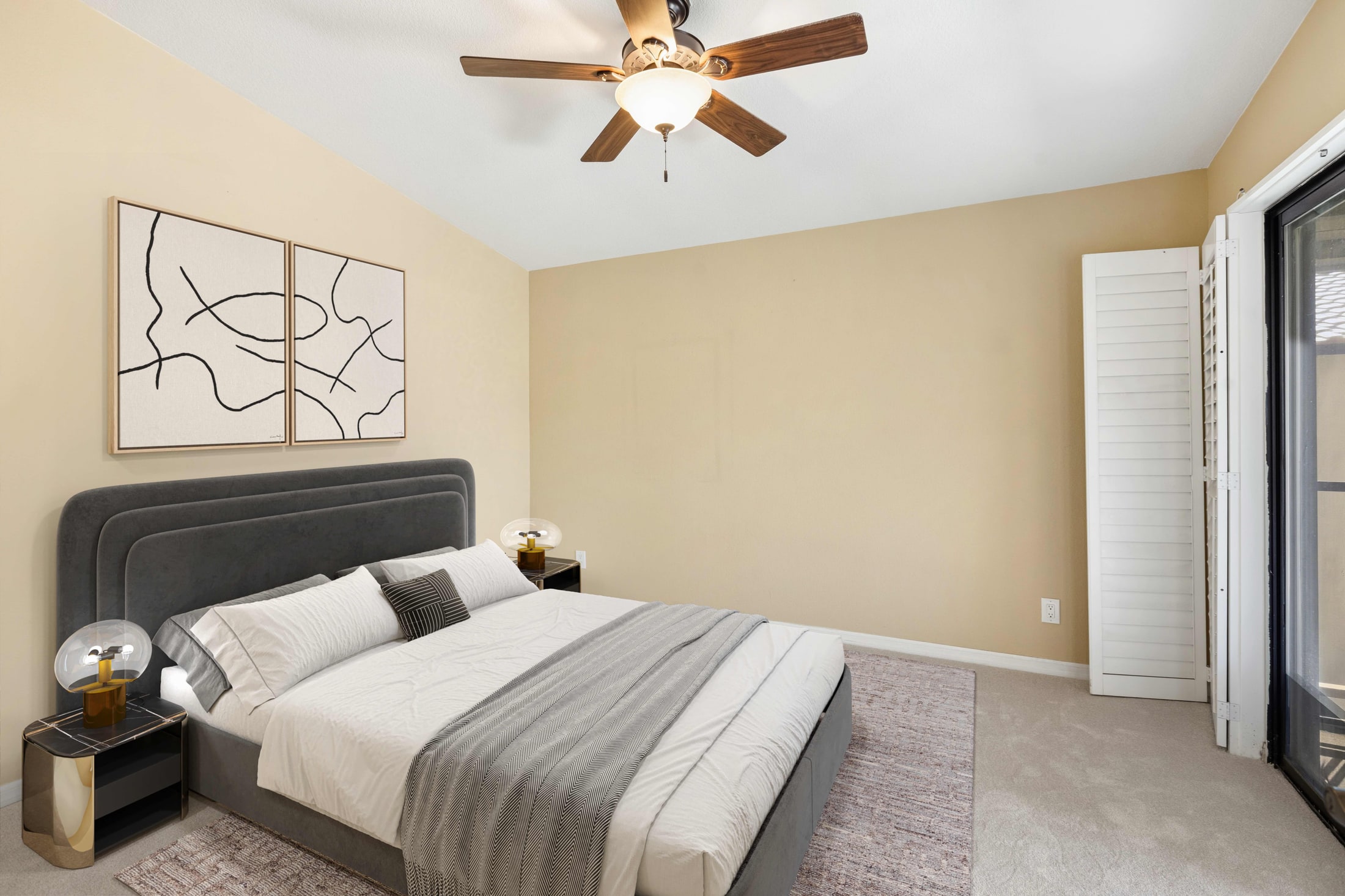 Furniture is what tells a buyer this bedroom takes a queen with room to walk round it.