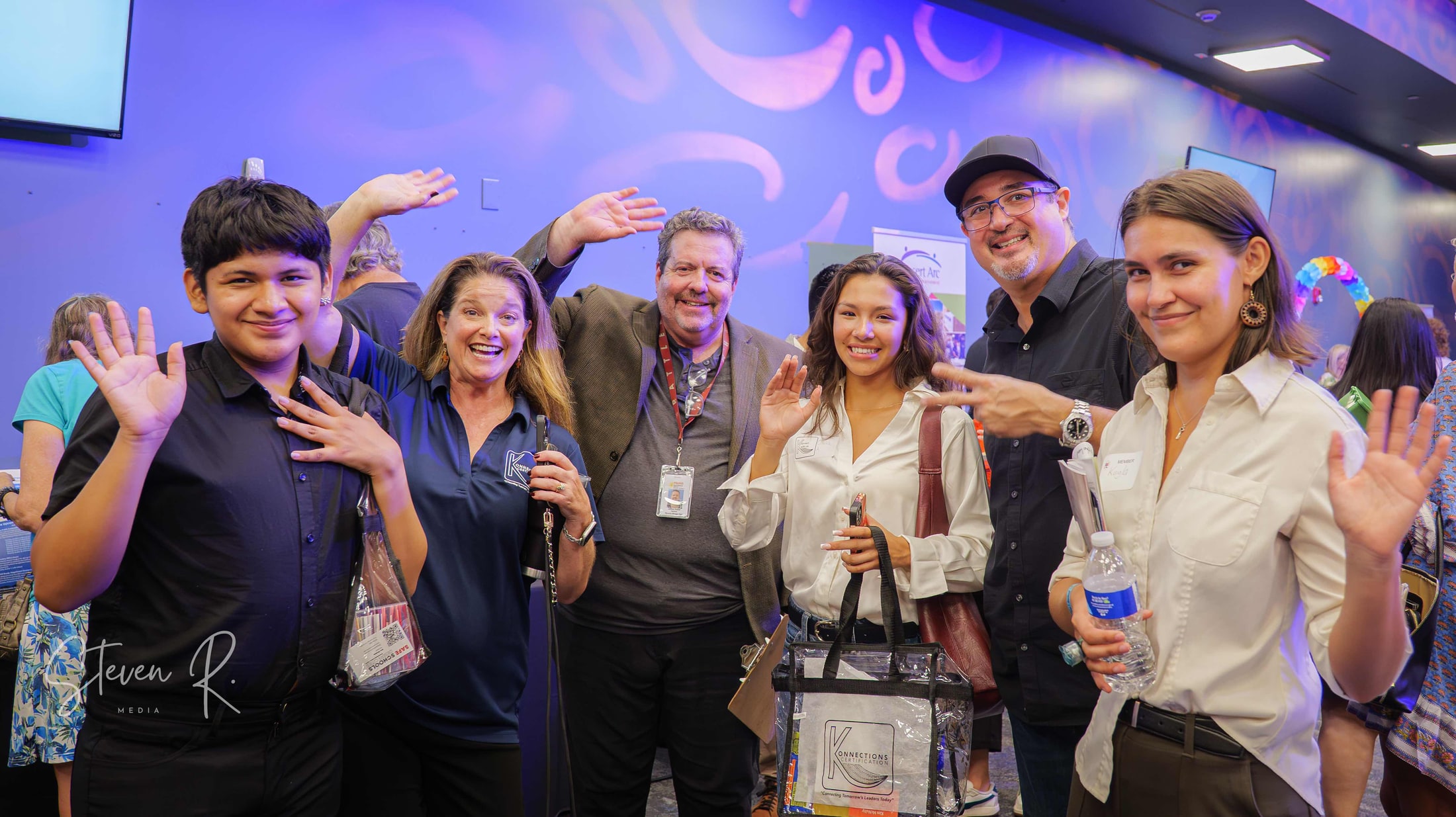 Guests posing together at a community mixer