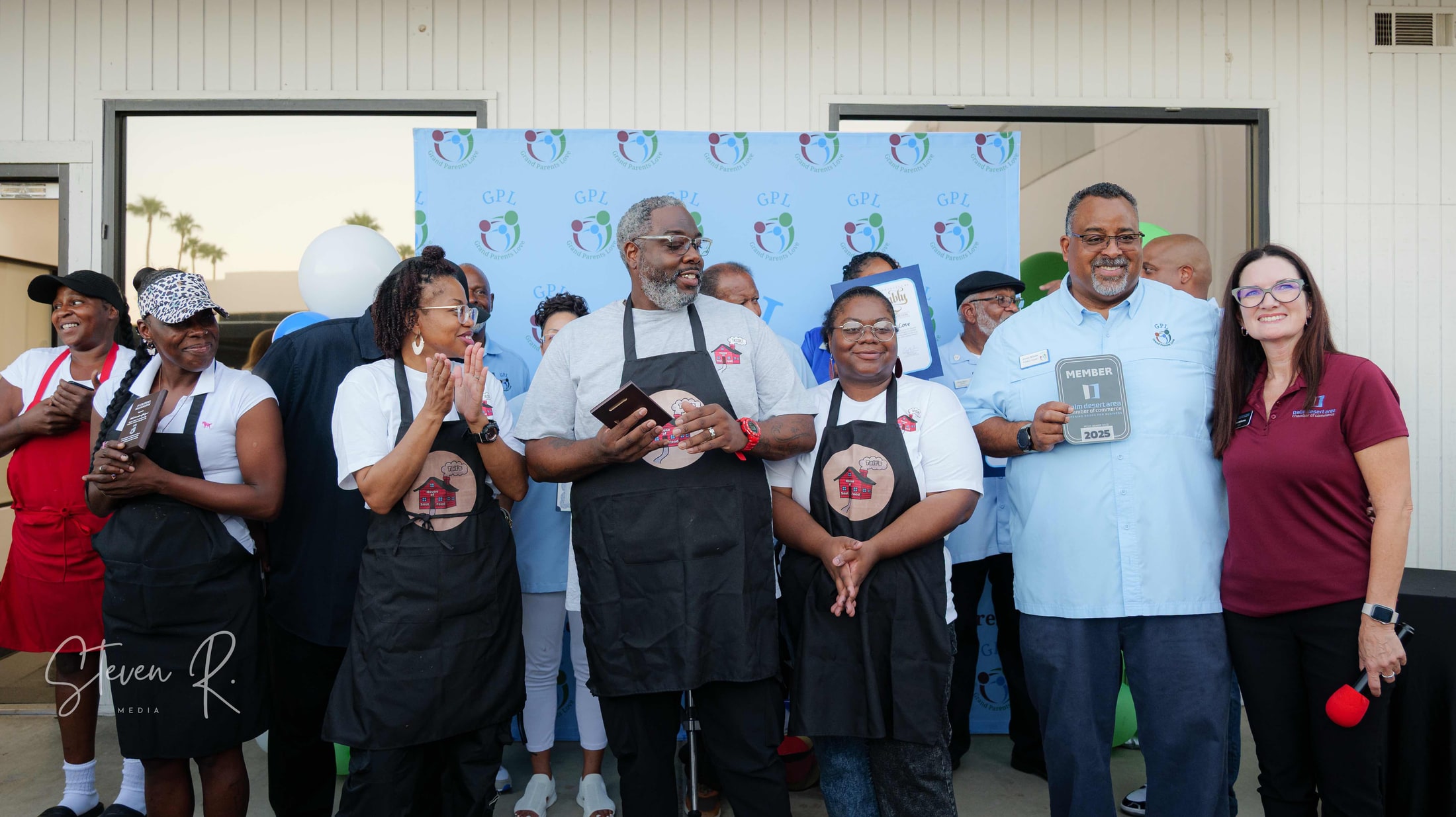 Business owners cutting the ribbon at a Coachella Valley grand opening