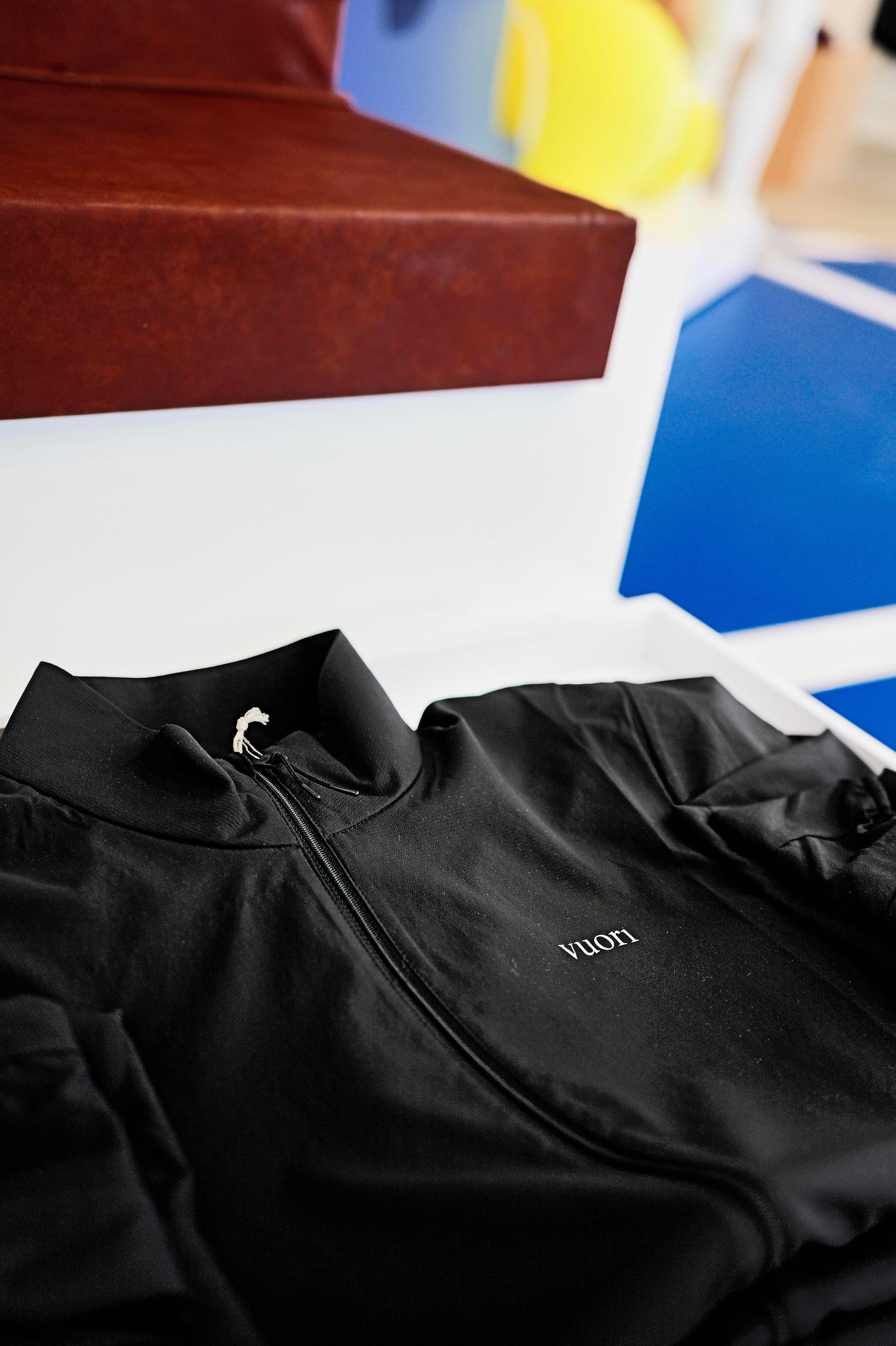 Close frame of a Vuori jacket on the Jack is Back display