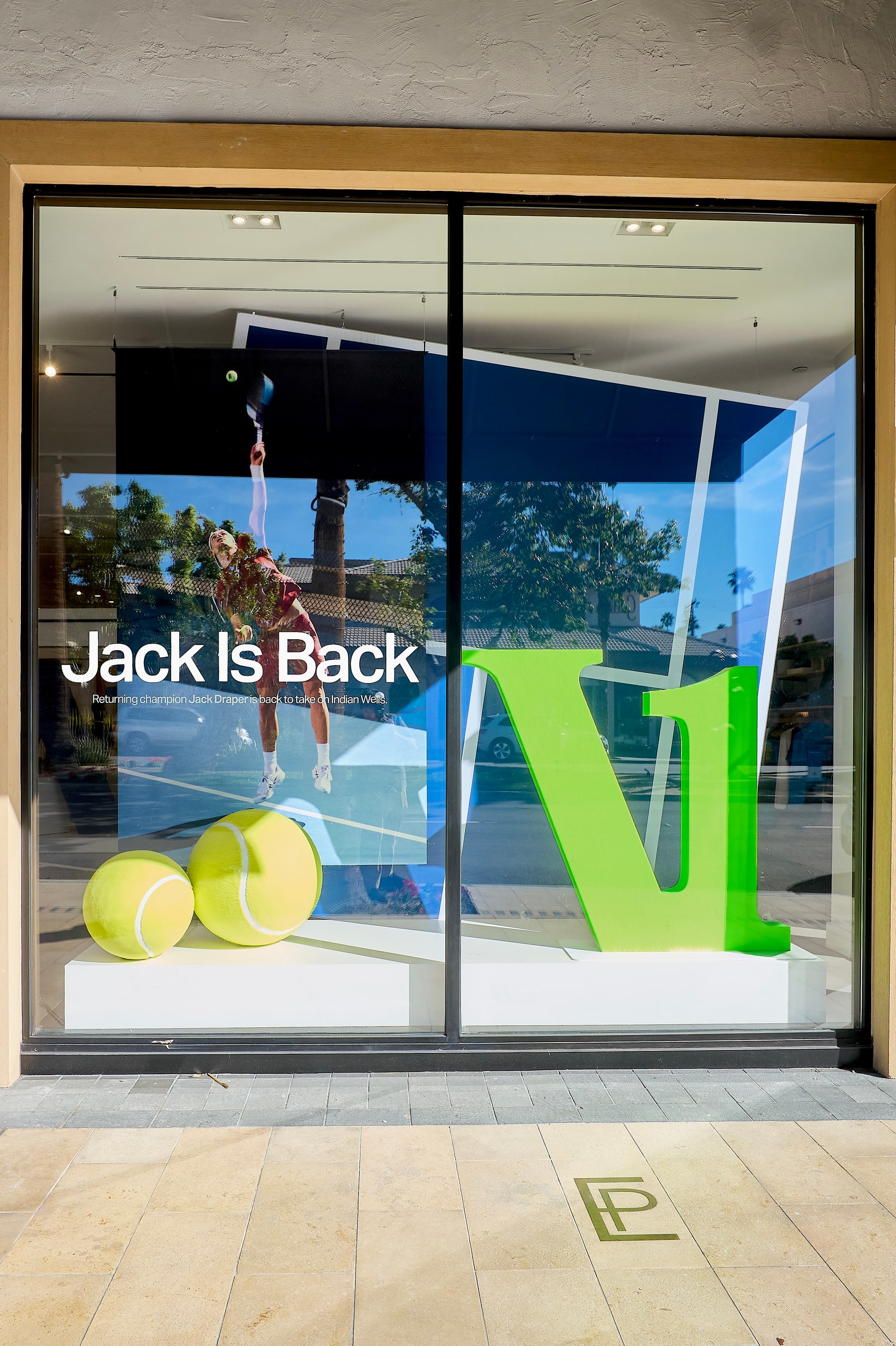 The Jack is Back window display with tennis balls
