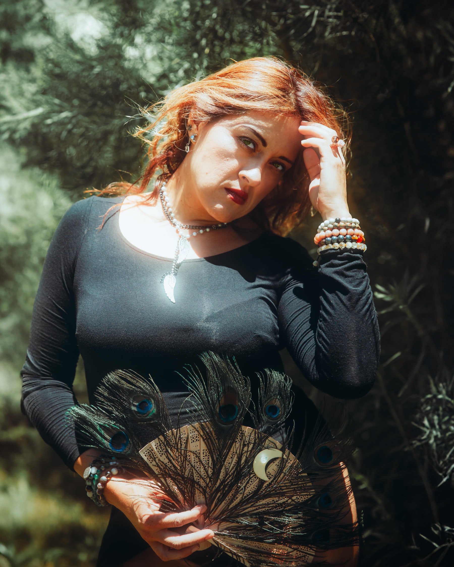 Portrait of a woman standing in tall grass at White Water