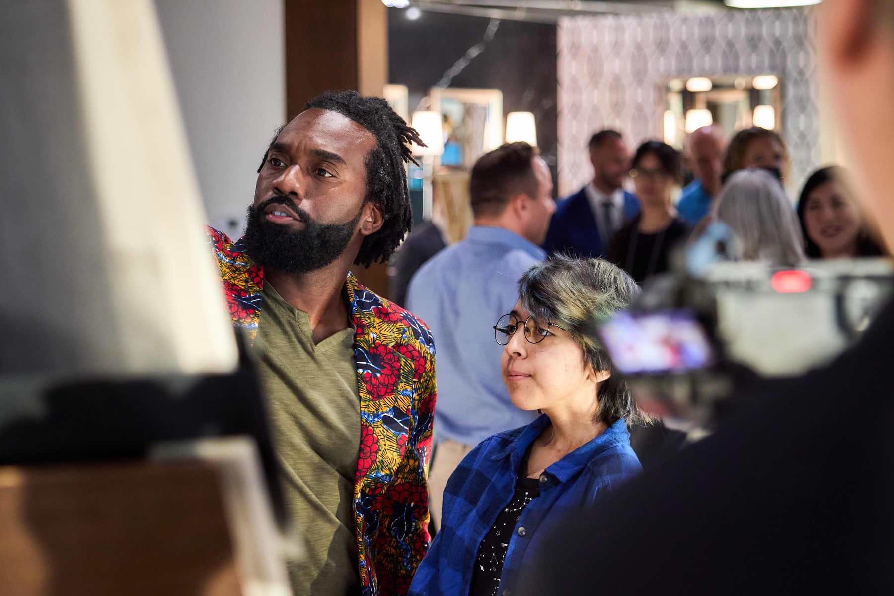 Guests talking at the Art From the Heart evening