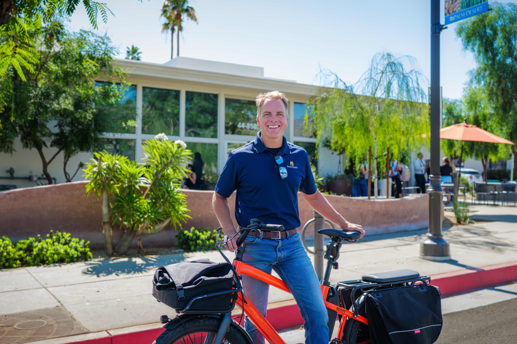 A city official with his bicycle outside Palm Desert city hall