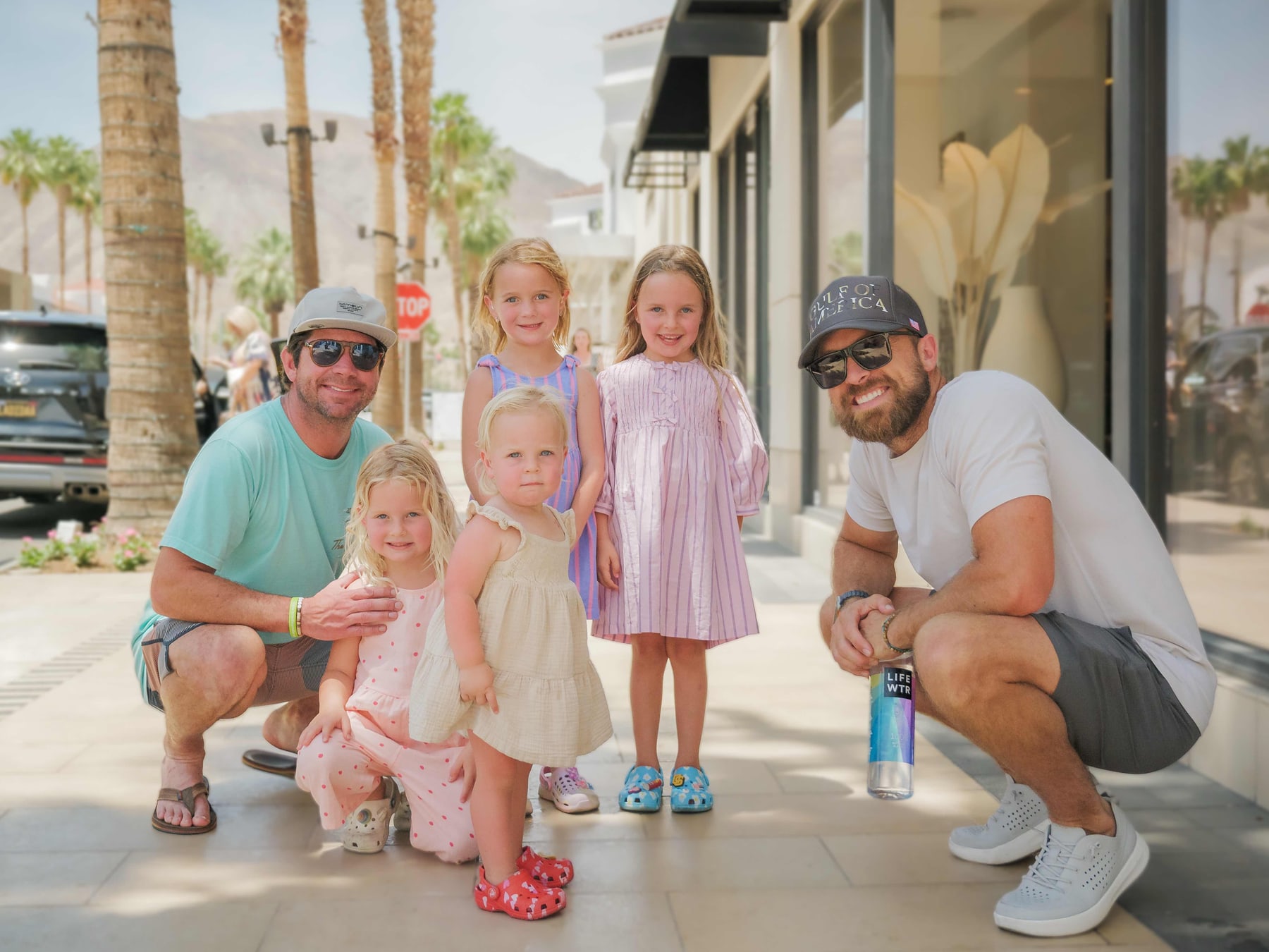 A father and his three children on El Paseo