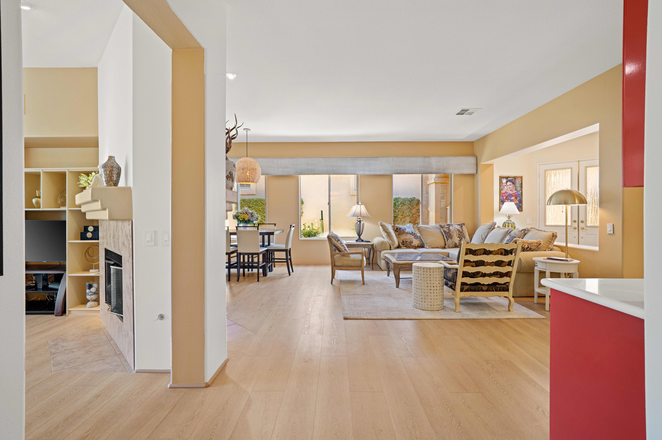Living and dining area looking through to the covered patio