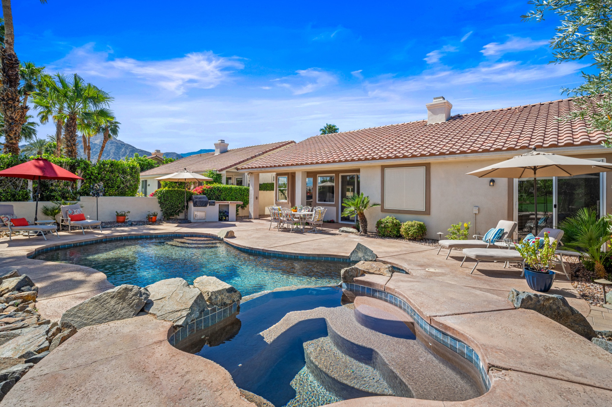 Backyard pool with mountain views